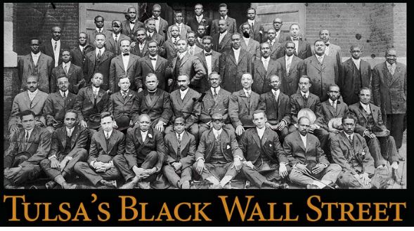 Tulsa's Black Wall Street — a large formal group photograph of Black businessmen and community leaders in Greenwood, Tulsa, Oklahoma
