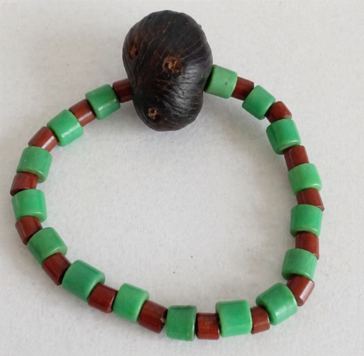 Hand of Ifá initiation object with sacred beads and ikin